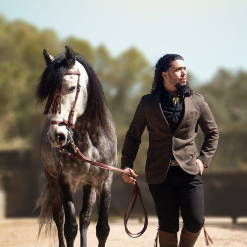 Fotografía de Rosa Jurado de un caballo y su jinete.